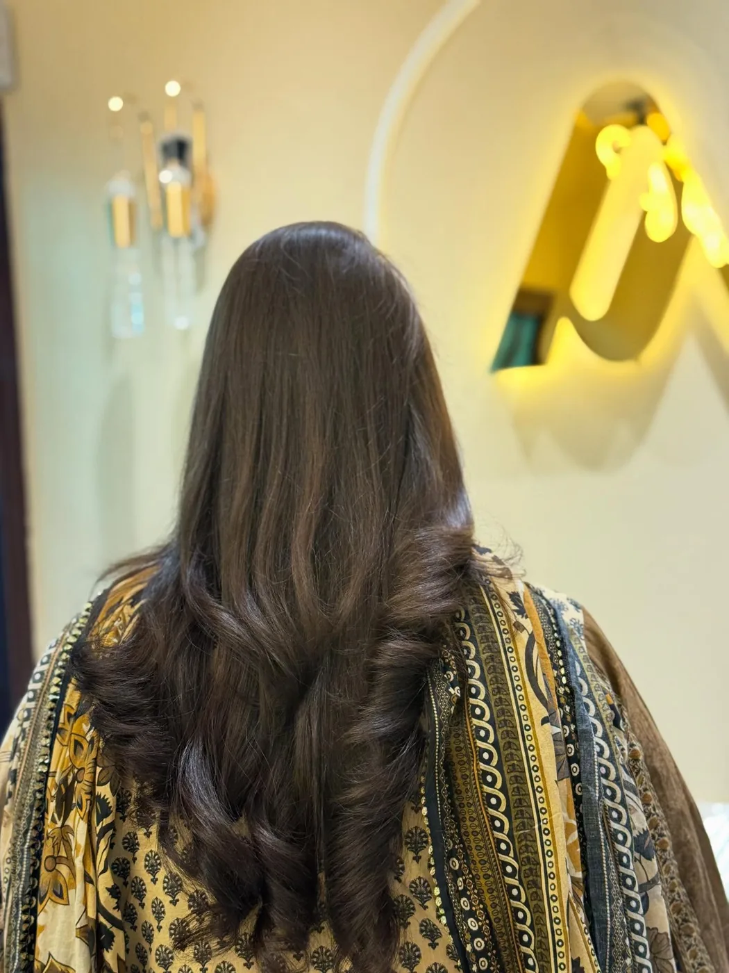 Balayage colour with soft curls after treatment
